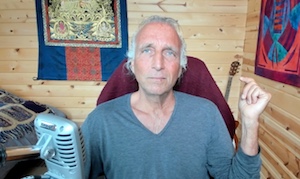 Francesco behind a microphone in his studio