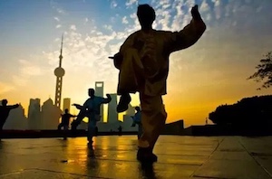 people doing tai ch at sunset